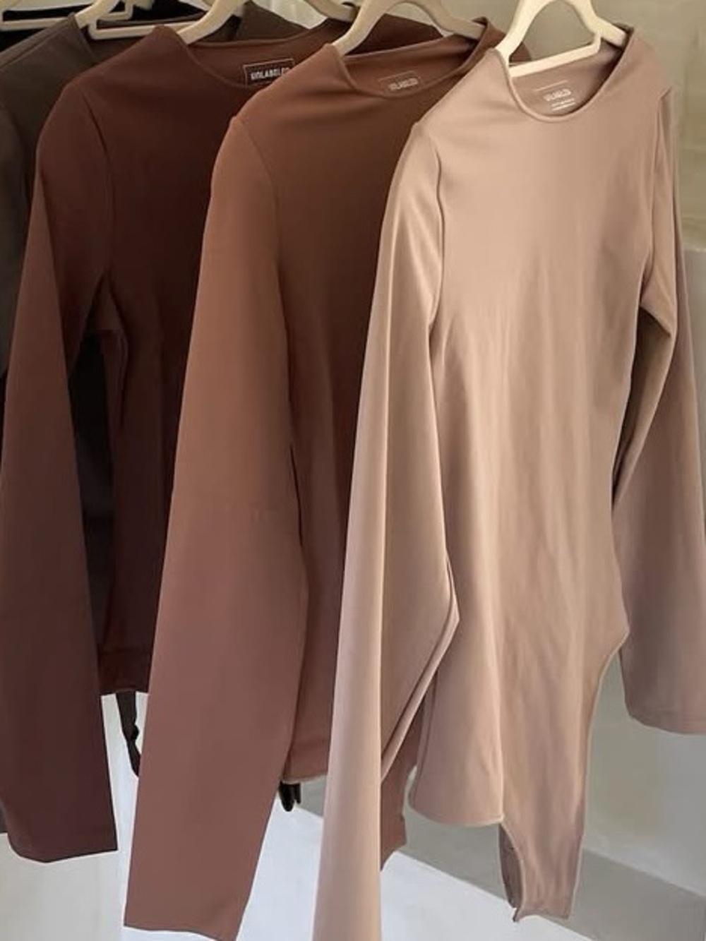 Unlabeled by Anna Petrosian Long Sleeve Bodysuit Tan